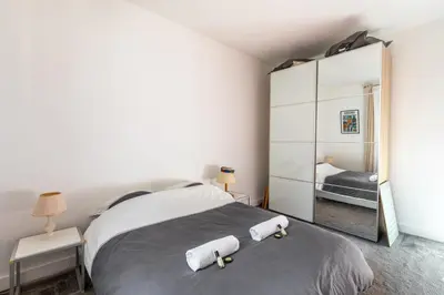 Un ou plusieurs lits dans un hébergement de l'établissement GuestReady - central apartment at Les Invalides