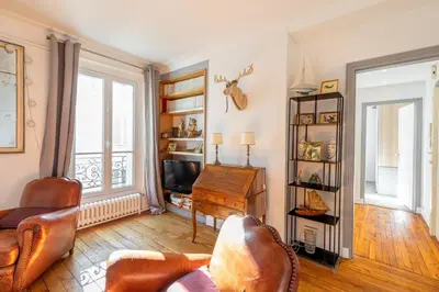 Coin salon dans l'établissement GuestReady - central apartment at Les Invalides