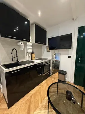Cuisine ou kitchenette dans l'établissement Appartement