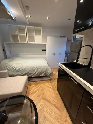 Cuisine ou kitchenette dans l'établissement Appartement