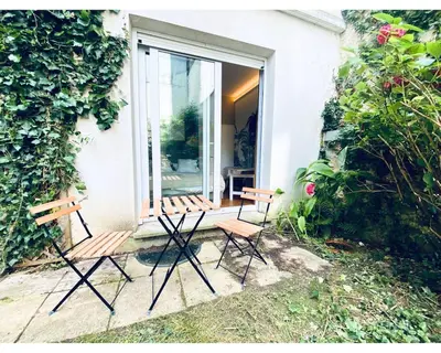 Jardin de l'établissement Chambre Cosy chez l habitant avec salle de bain et jardin privé