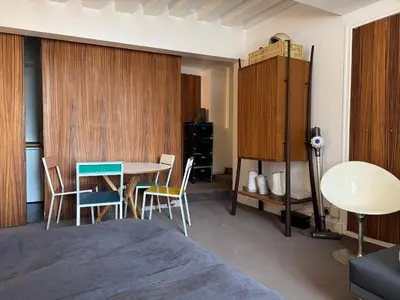 Coin salon dans l'établissement Suite indépendante studio top centre Marais