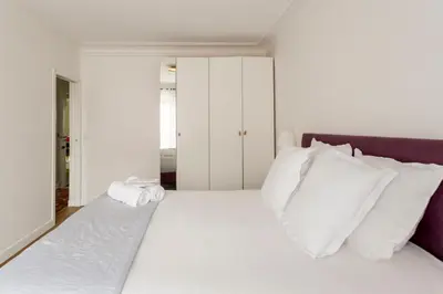 Un ou plusieurs lits dans un hébergement de l'établissement Porte Versailles 1BDR
