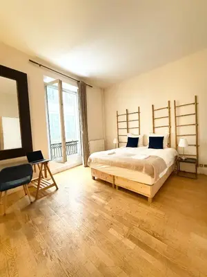 Un ou plusieurs lits dans un hébergement de l'établissement Studio Saint Germain