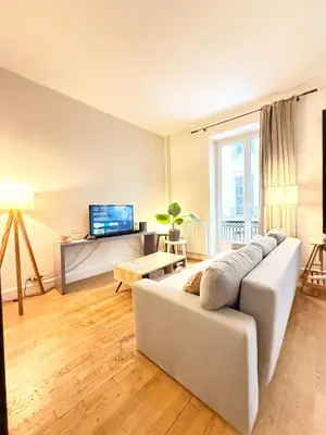 Télévision ou salle de divertissement dans l'établissement Studio Saint Germain