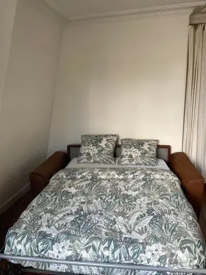 Un ou plusieurs lits dans un hébergement de l'établissement Appartement Porte de versailles