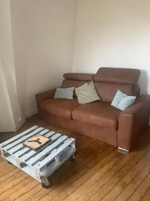 Coin salon dans l'établissement Appartement Porte de versailles