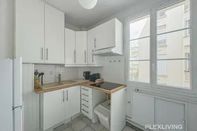 Cuisine ou kitchenette dans l'établissement Flexliving - room - Lindet