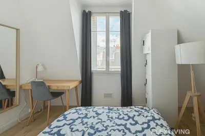 Un ou plusieurs lits dans un hébergement de l'établissement Flexliving - room - Houel