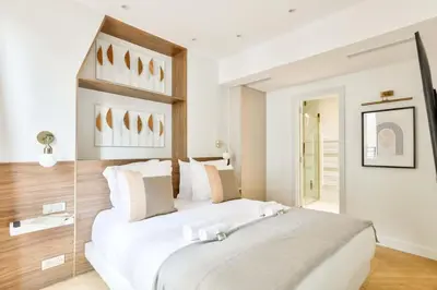 Un ou plusieurs lits dans un hébergement de l'établissement Terrace Getaway - Le Marais - with AC