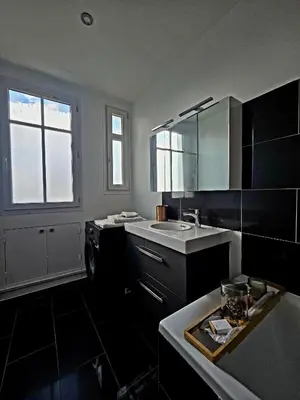 Cuisine ou kitchenette dans l'établissement APPARTEMENT T2 Spacieux et lumineux
