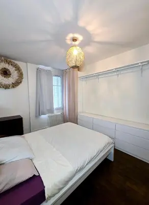 Un ou plusieurs lits dans un hébergement de l'établissement APPARTEMENT T2 Spacieux et lumineux