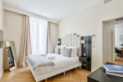 Un ou plusieurs lits dans un hébergement de l'établissement Family Retreat - Le Marais - with AC