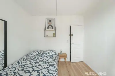Un ou plusieurs lits dans un hébergement de l'établissement Flexliving - room - Houel