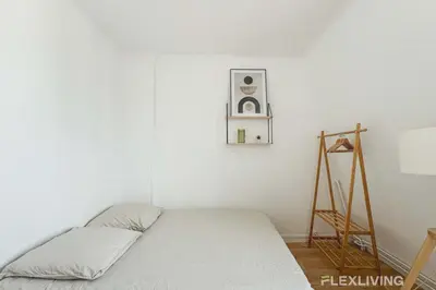 Un ou plusieurs lits dans un hébergement de l'établissement Flexliving - room - Houel