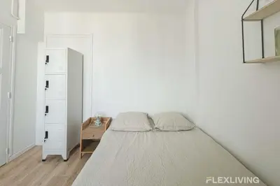 Un ou plusieurs lits dans un hébergement de l'établissement Flexliving - room - Houel