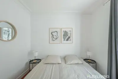 Un ou plusieurs lits dans un hébergement de l'établissement Flexliving - room - Lindet