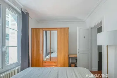 Un ou plusieurs lits dans un hébergement de l'établissement Flexliving - room - Lindet