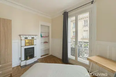Cuisine ou kitchenette dans l'établissement Flexliving - Room - Lamarck