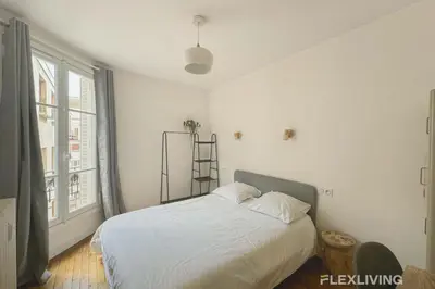 Un ou plusieurs lits dans un hébergement de l'établissement Flexliving - room - Abbé Groult