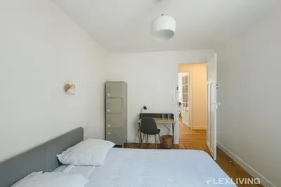 Un ou plusieurs lits dans un hébergement de l'établissement Flexliving - room - Abbé Groult