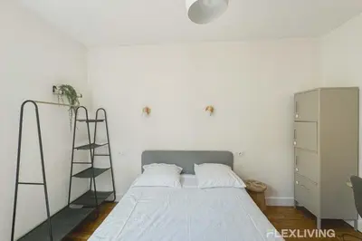 Un ou plusieurs lits dans un hébergement de l'établissement Flexliving - room - Abbé Groult