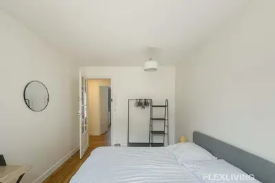 Un ou plusieurs lits dans un hébergement de l'établissement Flexliving - room - Abbé Groult