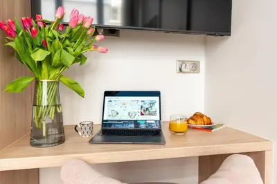 Télévision ou salle de divertissement dans l'établissement Romantic Getaway - Le Marais - with AC
