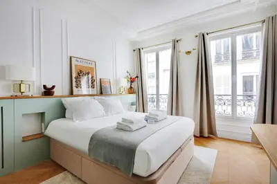 Un ou plusieurs lits dans un hébergement de l'établissement Cosy apartment - 1BR-4P - Jardin du Luxembourg