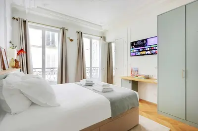 Un ou plusieurs lits dans un hébergement de l'établissement Cosy apartment - 1BR-4P - Jardin du Luxembourg