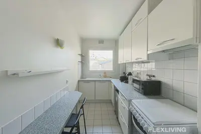 Cuisine ou kitchenette dans l'établissement Flexliving - room - Croix Nivert
