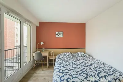 Un ou plusieurs lits dans un hébergement de l'établissement Flexliving - room - Croix Nivert