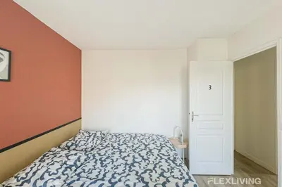 Un ou plusieurs lits dans un hébergement de l'établissement Flexliving - room - Croix Nivert