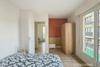 Un ou plusieurs lits dans un hébergement de l'établissement Flexliving - room - Croix Nivert