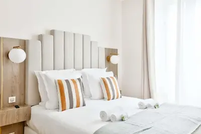 Un ou plusieurs lits dans un hébergement de l'établissement Luxurious Family Flat - Le Marais - With AC