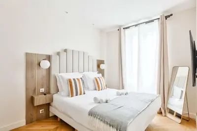 Un ou plusieurs lits dans un hébergement de l'établissement Luxurious Family Flat - Le Marais - With AC