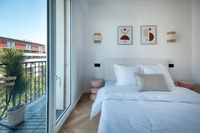 Un ou plusieurs lits dans un hébergement de l'établissement Appartement Luxe 3 Chambres Lits Doubles 6 Personnes - Proche Paris 16, Parc des Princes, Roland-Garros
