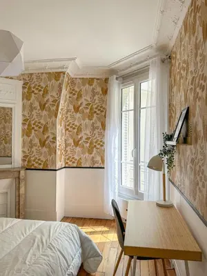 Un ou plusieurs lits dans un hébergement de l'établissement T3 3 chambre Paris 15 au cœur de cafés branchés