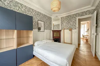 Un ou plusieurs lits dans un hébergement de l'établissement T3 3 chambre Paris 15 au cœur de cafés branchés
