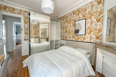 Un ou plusieurs lits dans un hébergement de l'établissement T3 3 chambre Paris 15 au cœur de cafés branchés