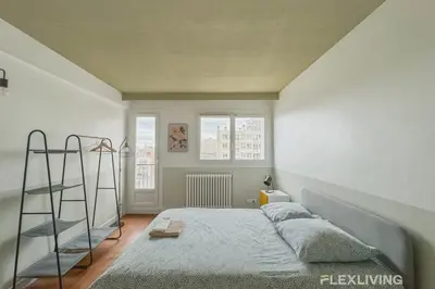 Un ou plusieurs lits dans un hébergement de l'établissement Flexliving - Whole Flat - Losserand