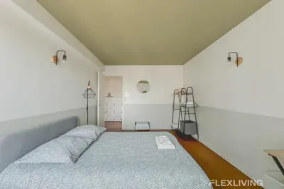 Un ou plusieurs lits dans un hébergement de l'établissement Flexliving - Whole Flat - Losserand