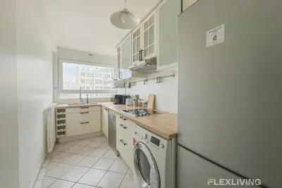 Cuisine ou kitchenette dans l'établissement Flexliving - room - Losserand