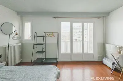 Un ou plusieurs lits dans un hébergement de l'établissement Flexliving - room - Losserand