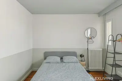 Un ou plusieurs lits dans un hébergement de l'établissement Flexliving - room - Losserand