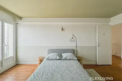 Un ou plusieurs lits dans un hébergement de l'établissement Flexliving - room - Losserand