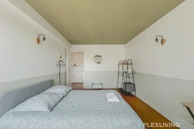 Un ou plusieurs lits dans un hébergement de l'établissement Flexliving - room - Losserand