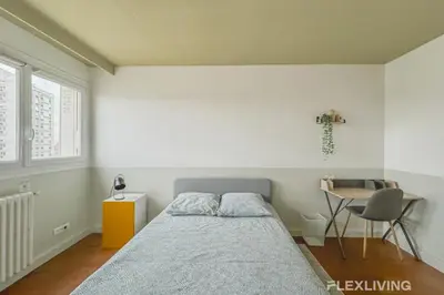 Un ou plusieurs lits dans un hébergement de l'établissement Flexliving - room - Losserand