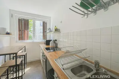 Cuisine ou kitchenette dans l'établissement Flexliving - Whole flat - Friant