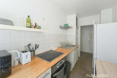 Cuisine ou kitchenette dans l'établissement Flexliving - Whole flat - Friant